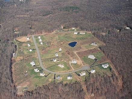 A picture containing aerial photography of an outdoor area and forest fragmentation