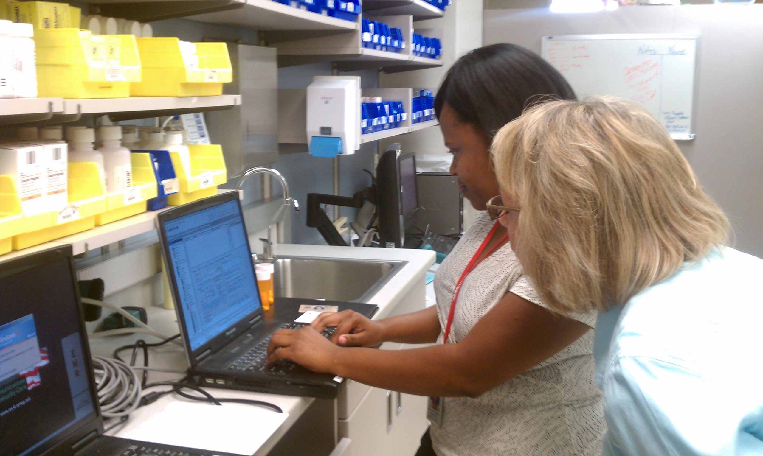 Image showing nurses looking at electronic health record