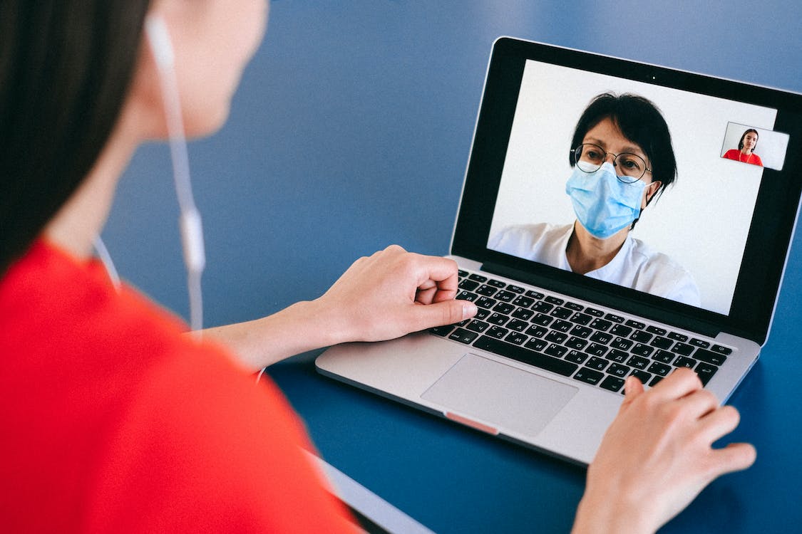 Doctor performing telehealth visit