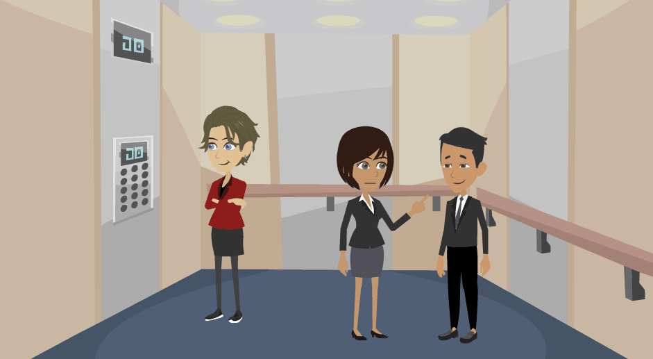 Jane stands in the centre of an elevator speaking with a man. The man stands to the left and another woman stands to her right.